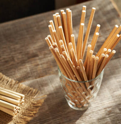 Ecological paper and bamboo drinking straws on a table