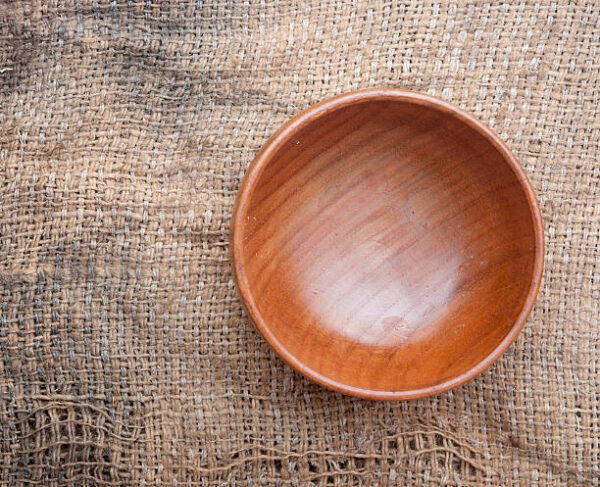 Wooden utensils on old worn burlap