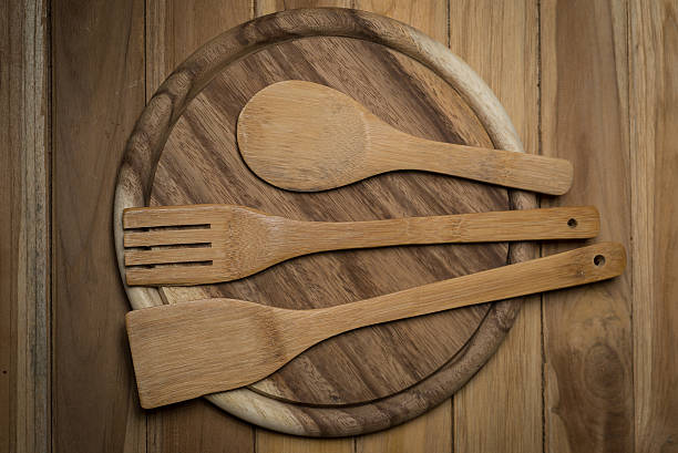 Kitchenware on wood background