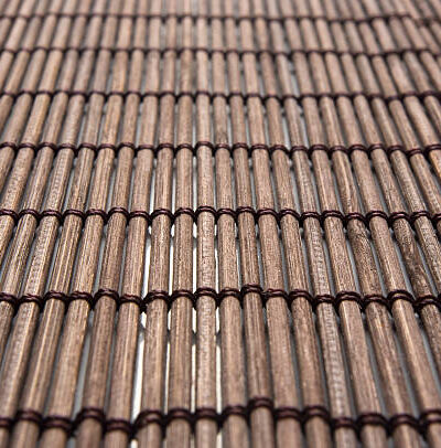 Brown bamboo mat stand food, close up, macro